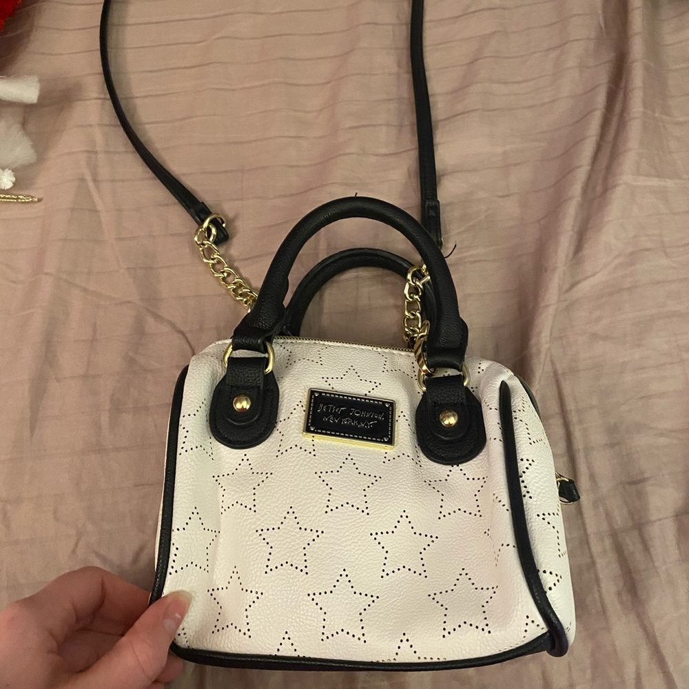 Betsey Johnson leather hand bag/ cross body could be worn as either gently used